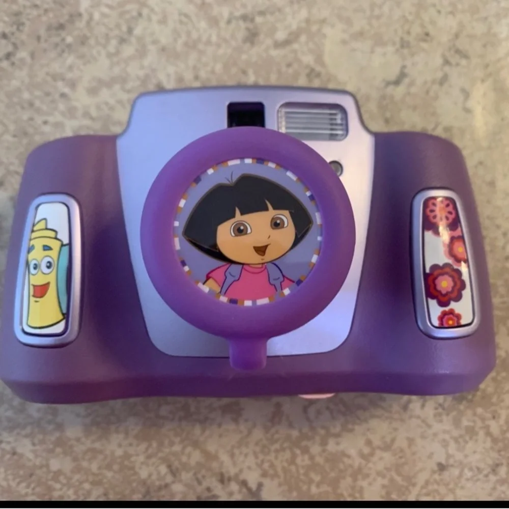 Dora NDC 6003 - DTE Power Memorex Flash JR. Rugged 0.3 mp Digital Camera -Purple